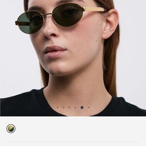 Elegant Gold Oval Sunglasses